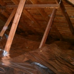 Radiant barrier insulation installation in attic